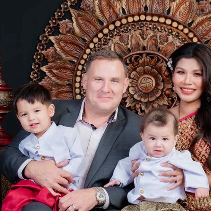 Ben Cunningham with his wife Ploy and their two sons