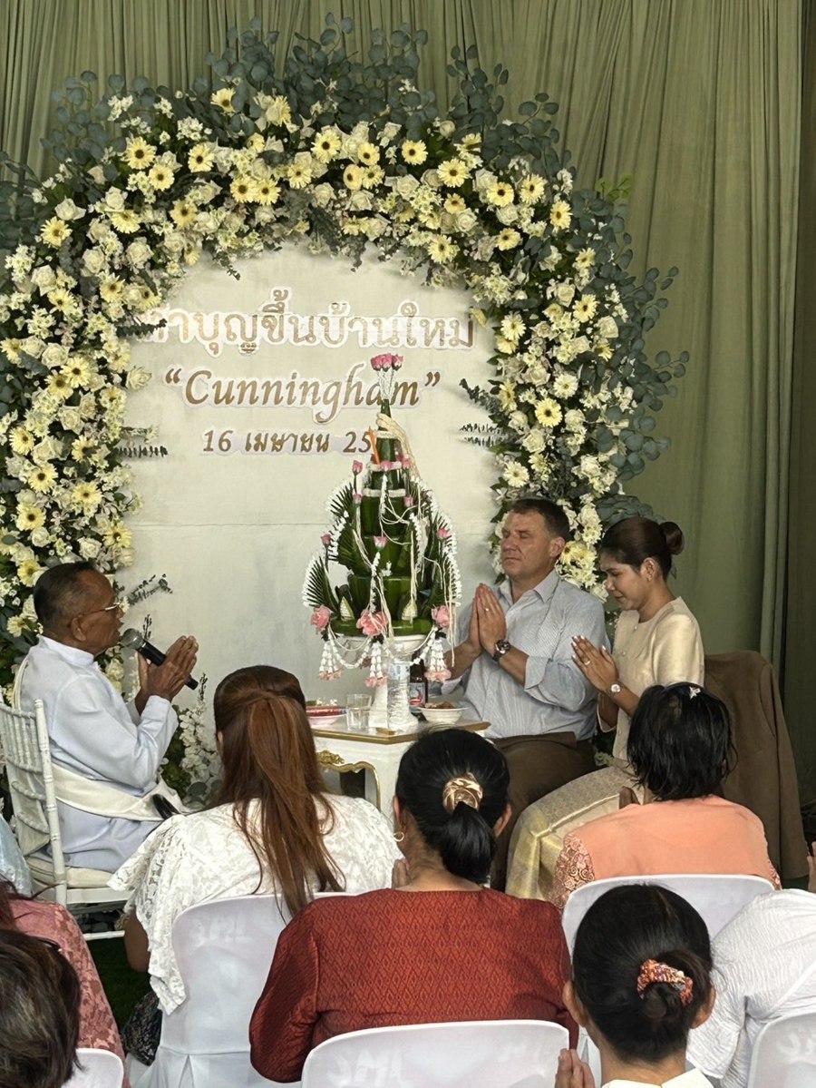 A traditional house-blessing ceremony for the Cunningham family, monk presiding